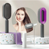 Self-cleaning hairbrush