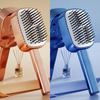 Self-cleaning hairbrush