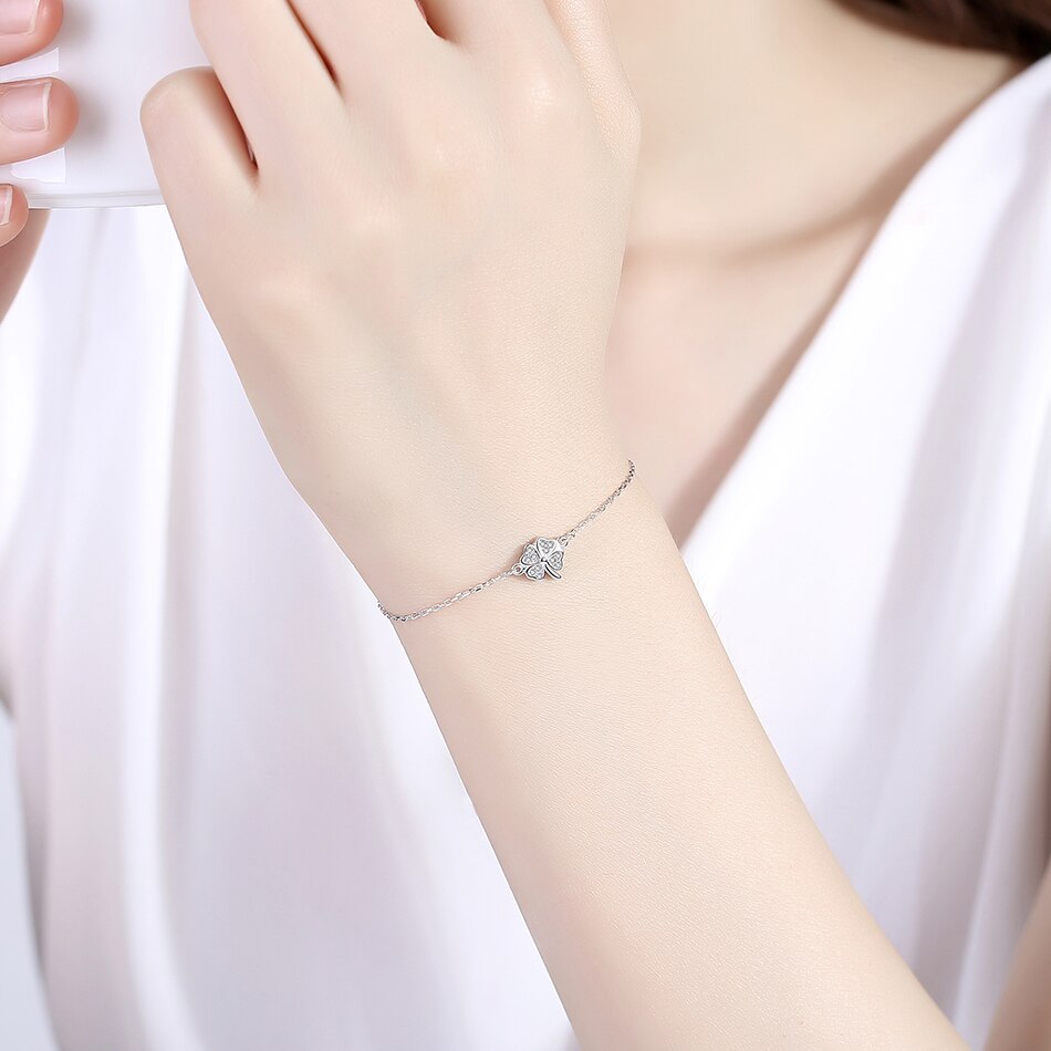 ucky Eye Love Heart Charm Bracelet: Sterling Silver with Blue Clover