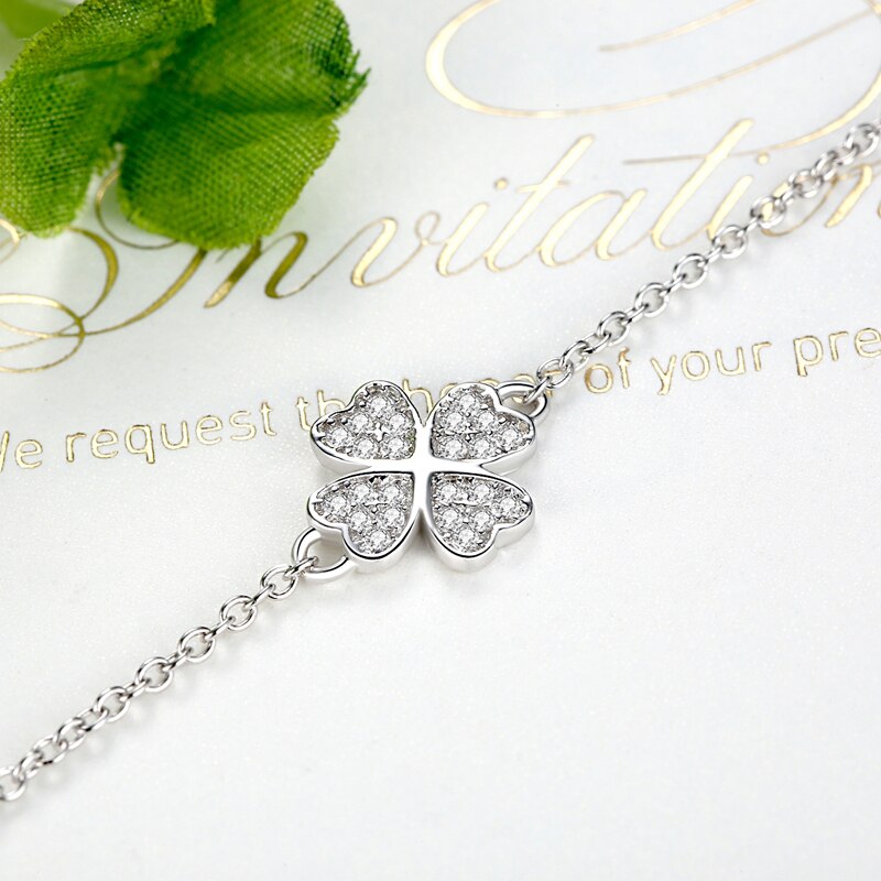 ucky Eye Love Heart Charm Bracelet: Sterling Silver with Blue Clover