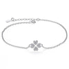 ucky Eye Love Heart Charm Bracelet: Sterling Silver with Blue Clover