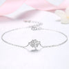ucky Eye Love Heart Charm Bracelet: Sterling Silver with Blue Clover