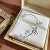 Silver plated metal butterfly earrings with sparkling zircon accents - non-pierced ear cuffs for women as fashionable jewelry