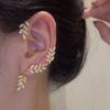 Silver plated metal butterfly earrings with sparkling zircon accents - non-pierced ear cuffs for women as fashionable jewelry