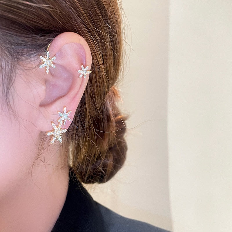 Silver plated metal butterfly earrings with sparkling zircon accents - non-pierced ear cuffs for women as fashionable jewelry