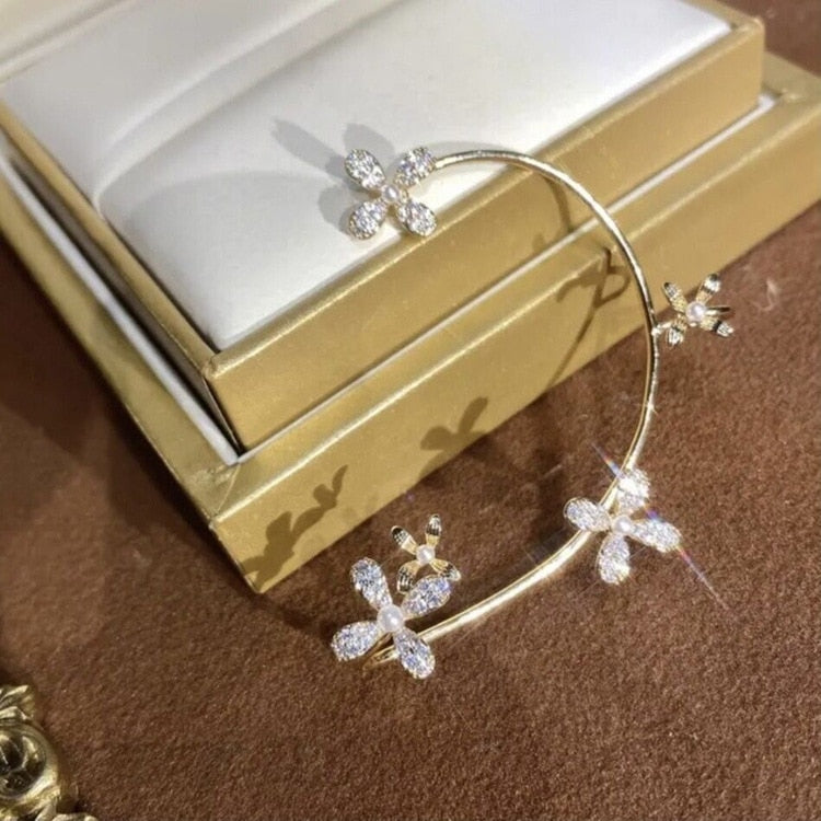 Silver plated metal butterfly earrings with sparkling zircon accents - non-pierced ear cuffs for women as fashionable jewelry