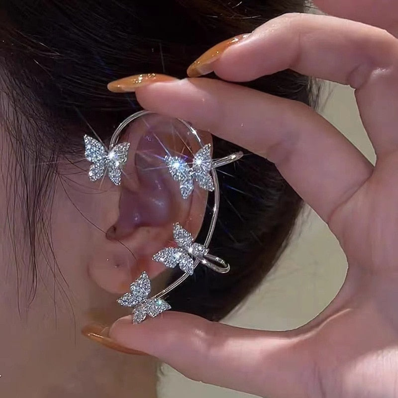Silver plated metal butterfly earrings with sparkling zircon accents - non-pierced ear cuffs for women as fashionable jewelry