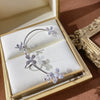 Silver plated metal butterfly earrings with sparkling zircon accents - non-pierced ear cuffs for women as fashionable jewelry