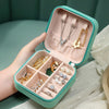 Versatile Rotating Jewelry Storage Box with Mirror