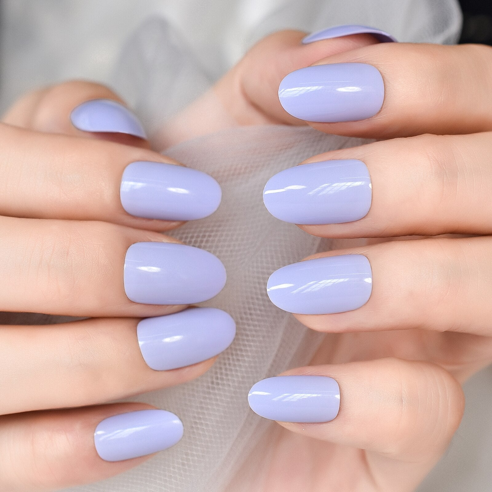 Radiant Reusable Medium Oval False Nails in Glossy Light Purple - Elevate Your Manicure Game