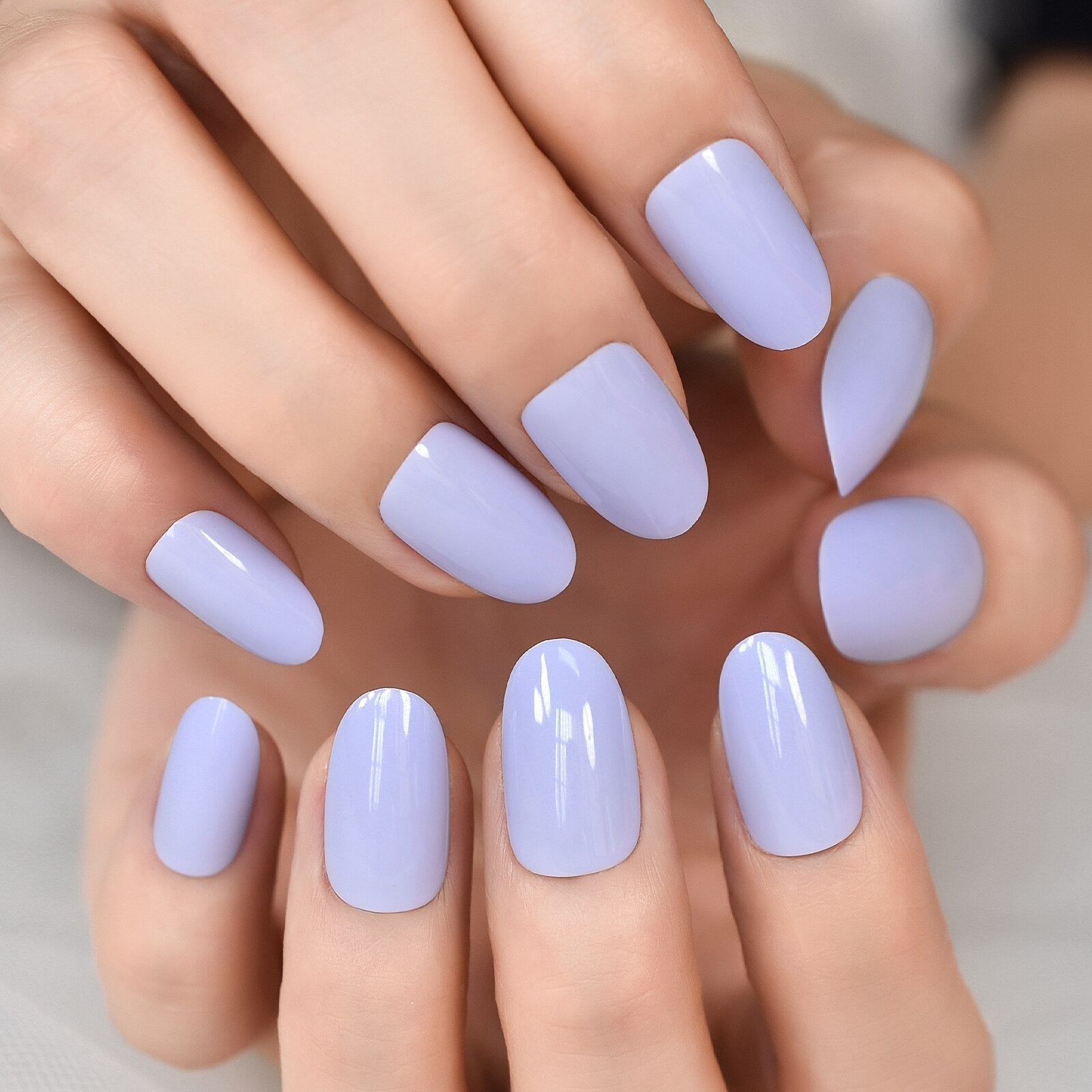 Radiant Reusable Medium Oval False Nails in Glossy Light Purple - Elevate Your Manicure Game