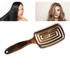 A versatile high-style brush for long hair