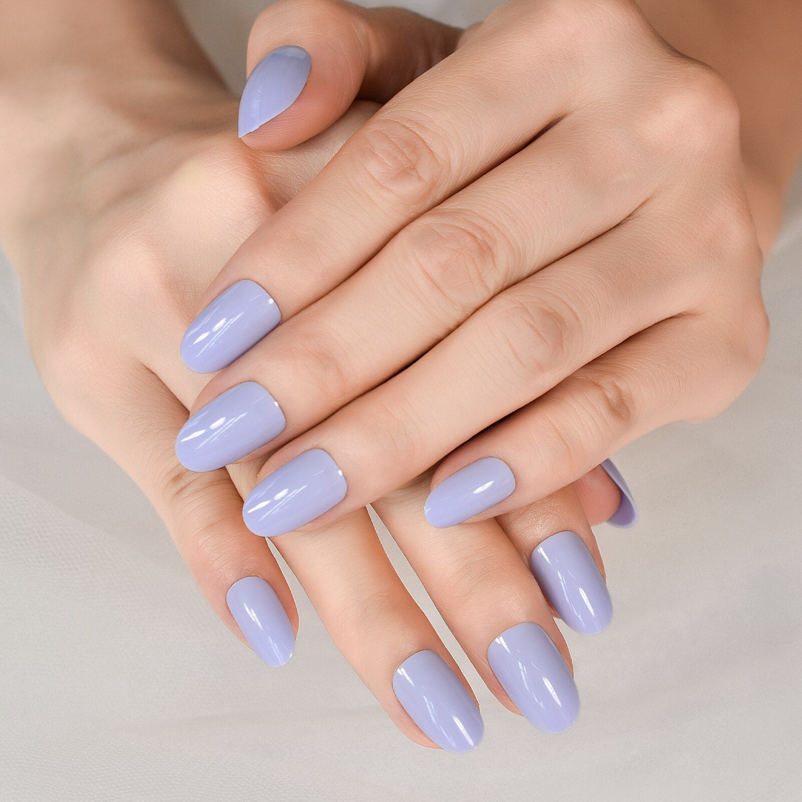 Radiant Reusable Medium Oval False Nails in Glossy Light Purple - Elevate Your Manicure Game
