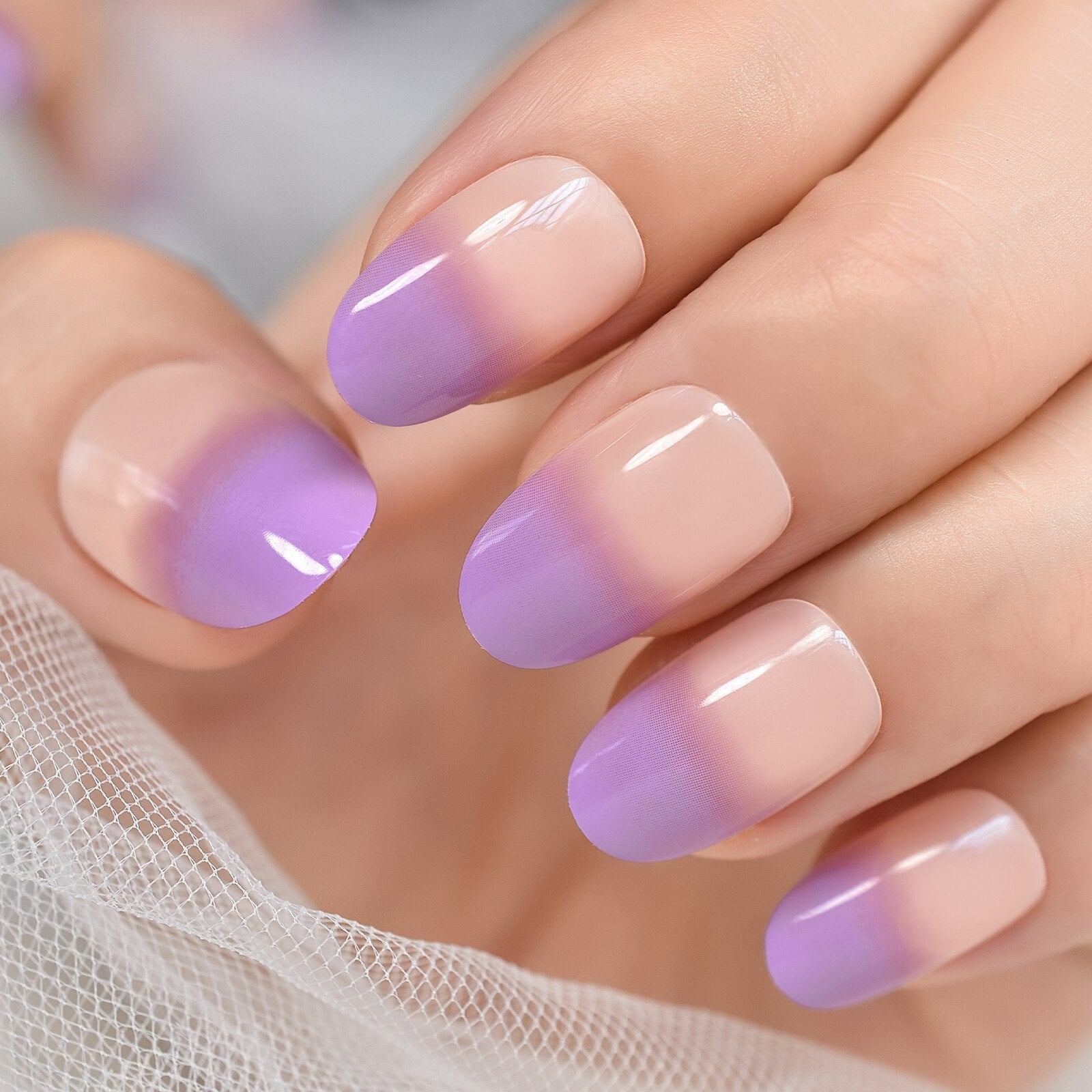 Radiant Reusable Medium Oval False Nails in Glossy Light Purple - Elevate Your Manicure Game